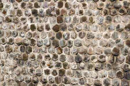River stone walls with cement adhesive, for a natural nuanced backgroundの写真素材