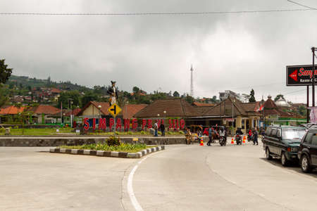 The Simpang Lima Selo area began to be crowded with visitors after the reduction in activity restrictions due to Covid-19. BOYOLALI CENTRAL JAVA, INDONESIA - NOVEMBER 7, 2021.のeditorial素材