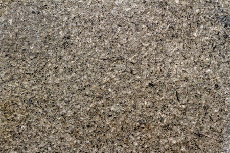 Walls from a mixture of stone and cement as reinforcement for sidewalks and building walls, abstract/texture for the backgroundの写真素材