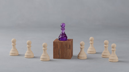 Several wooden chess pawns are surrounding another purple chess piece standing on a wooden block, a leadership concept in an organization that requires a differentiator from others to lead.の写真素材