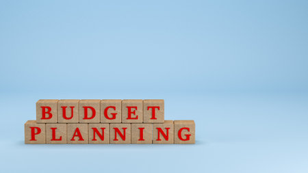 3D rendering of the word budget planning written on wooden cubes.の写真素材