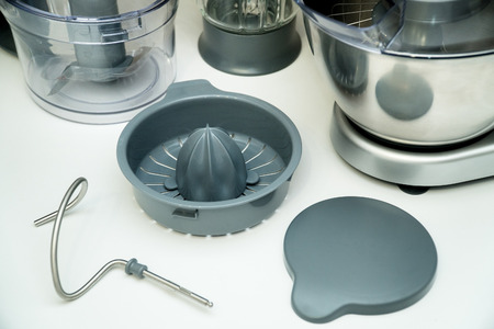 disassembled multifunctional food processor on kitchen countertopsの写真素材