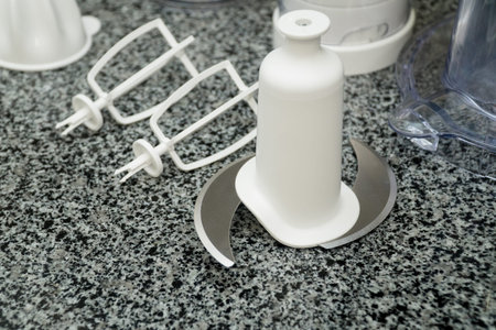 disassembled multifunctional food processor on kitchen countertops. Smoothie Maker. Electric Kitchen...