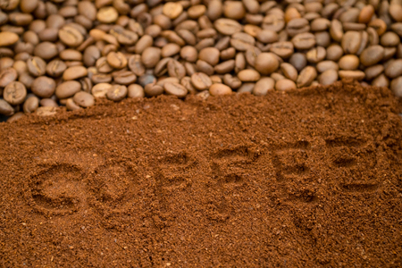 Coffee beans texture. In one half are whole grains of coffee, and in the other half - ground. Coffee backgroundの写真素材