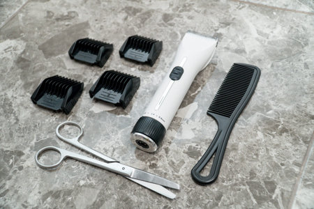 White clipper with attachment in hairdressing salons closeup