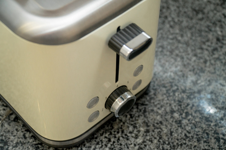 Toaster on a gray table in the modern kitchenの写真素材