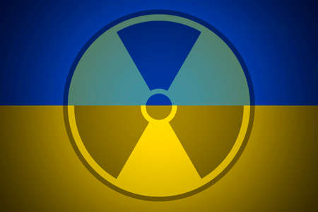 Radiation sign on the background of flag of Ukraine. The risk of nuclear war and radiation pollutionの写真素材