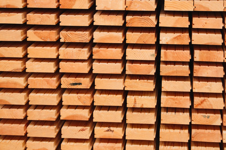 Wooden boards in a warehouse of building materialsの写真素材