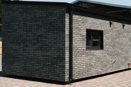 Newly built single storey prefabricated modular building. Prefabricated mobile wooden house on...