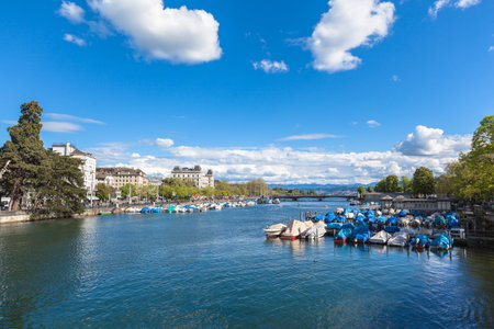View of Zurich old Town, the lake and the alps in a sunny sommer day, Switzerland