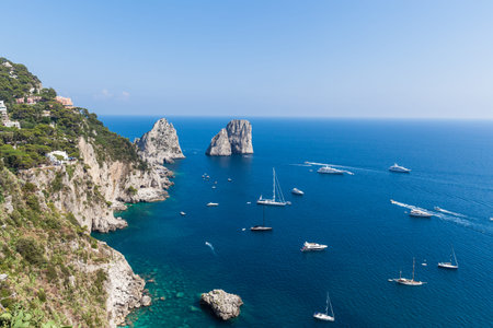 View of Faraglioni cliffs and the Tyrrhenian sea on Capri island, Italy, Europeの写真素材