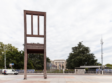 Geneva, Switzerland - August 23, 2014 - Broken Chair sculpture on the Place des Nations, in front of the UN offices in Geneva , Switzerland. It symbolises opposition to land mines and cluster bombs.のeditorial素材