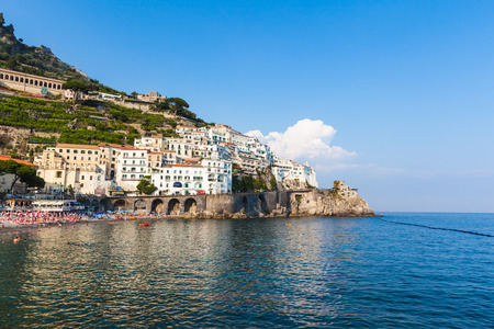 View of famous Amalfi town in the afternoon sunshine, on the coast of mediterranean sea in Italyの写真素材
