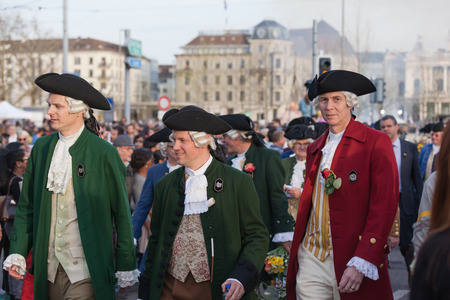 Zurich, Switzerland - April 13, 2015 - Group of men in traditional costumes on the traditional annual spring parade of Guilds (Sechselauten or Sachsiluute) as celebration of end of winter.のeditorial素材
