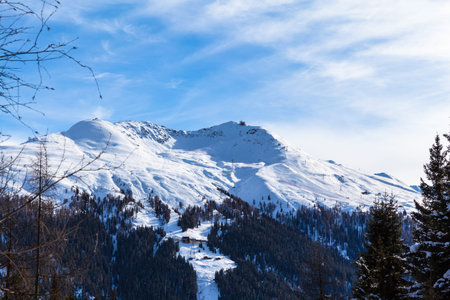Stunning view of snow covered Jacobshorn above Davos town in Winter, Canton of Grisons, Switzerland