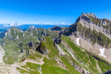 Stunning view of Alpstein Massif from Rotsteinpass, toward Wasserauen valley on the hiking trail to...