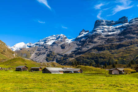 Stunning view of the mountain range of Titlis and Wendestock, the summit of the range north of the Susten Pass, between the Bernese Oberland and Central Switzerland.の写真素材