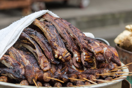 Close up view of Chinese bacon, (preserved meat), on sale on the street in Sichuan province, China,...