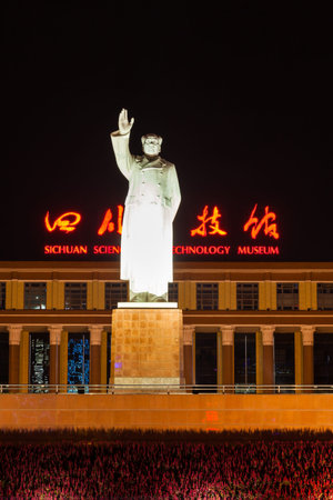 Chengdu, China - August 14, 2015 -Night view of the statue of Chairman Mao in front of the Sichuan...