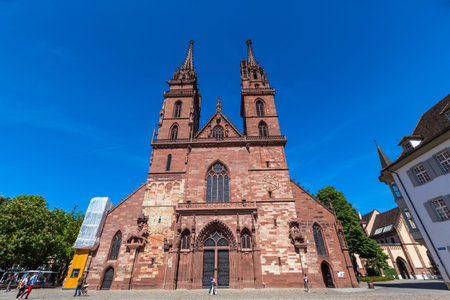 Front view of the historical Basel Minster cathedral, in Basel, Switzerland.
