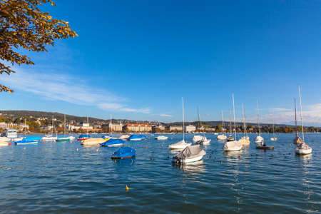 Beautiful view of the Zurich old town before sunset from the lake side at Mythenquai,, Zurich, Switzerlandのeditorial素材