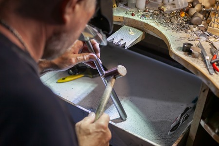 Work of the master, jeweler. Jewelry repair shop. Manufacturing of jewelry.の写真素材