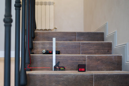 Manufacturing, repair of wooden stairs in a residential building.