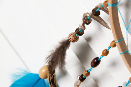 Turquoise dream catcher in bedroom interior . Bedroom decorの写真素材