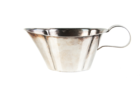 Vintage silver sauceboat isolated on white の写真素材