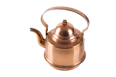 Vintage copper tea pot with handle isolated on white backgroundの写真素材