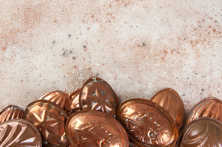 Vintage copper cookie molds on a concrete background. Copy space for text.の写真素材