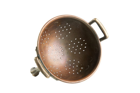 Vintage copper brass colander with handles isolated on white background