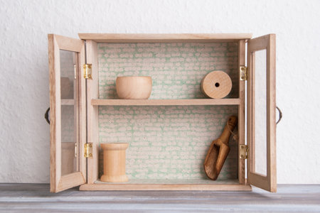 Small wooden buffet and wooden bath items. Copy space for text.の写真素材