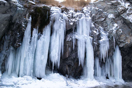 Frozen waterfalls by the Leh-Srinagar highway in winterの写真素材
