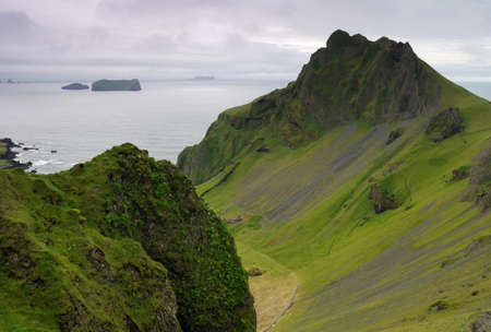 Hiking the volcanic Heimaey island in Icelandの写真素材