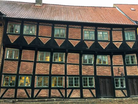 Wonderful well-kept historic buildings in Odense. Brick and wooden facades. 2020. Denmark.の写真素材