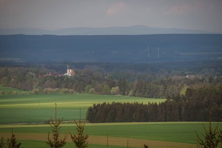 Panoramic shot of a beautiful Sussex hamlet of South Stoke near Arundel. A few houses and the 11th Century flint Church of St Leonards surrounded by lush green horse pastures. Czech Republicの写真素材