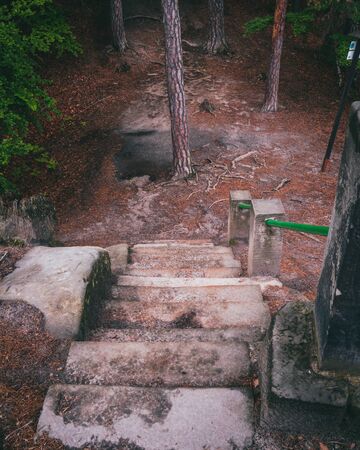 Red autumn forest park stair landscape. Autumn forest stairway view. Red autumn forest stairway down. Red autumn wallpaper. Czech Republicの写真素材