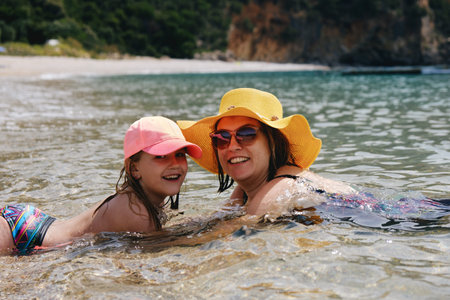 Mother and daughter at a beach