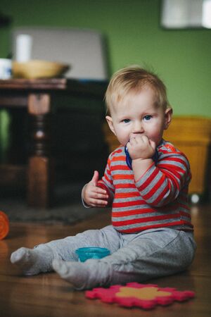 Baby girl at homeの写真素材