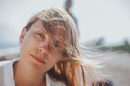 Portrait of a young woman enjoying outdoor