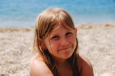 Toddler at a beach during summer holidayの写真素材