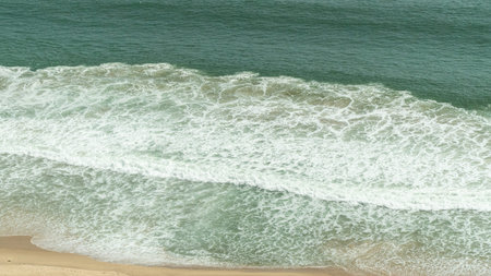 Sea waves crash on the shore