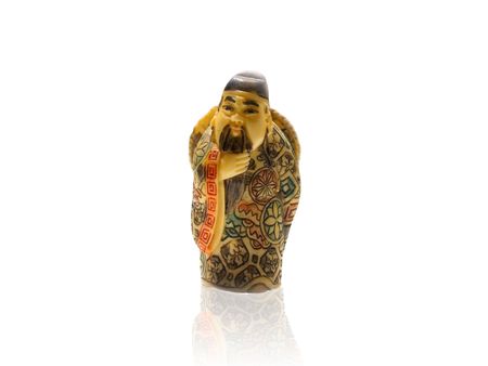 Netsuke. Traditional Japanese art. Isolated. White backgroundの写真素材