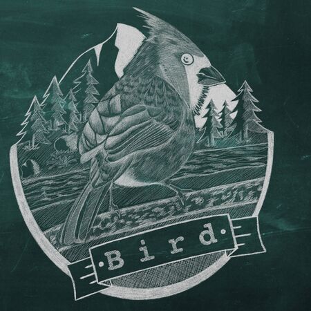 Signboard with the image of a bird.の写真素材