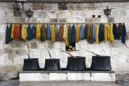 old dye-house, cans with ink and colored yarnの写真素材