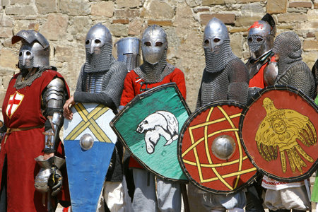 several knights on stone wall background