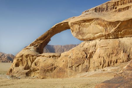 stone arch on blue sky backgroundの写真素材