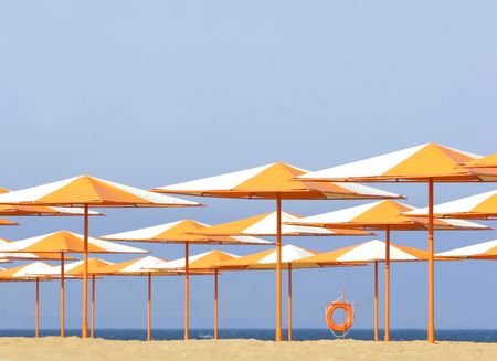 colorful umbrellas on beachの写真素材