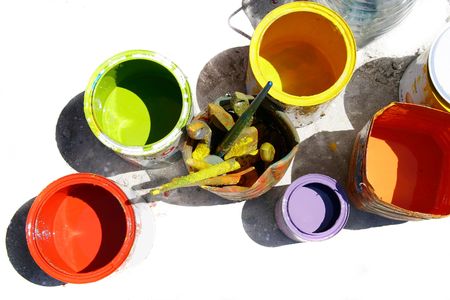cans with colors partly isolated over whiteの写真素材